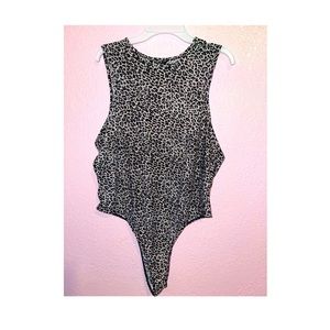 A SHEIN LEOPARD FITTED BODYSUIT only been used 3x